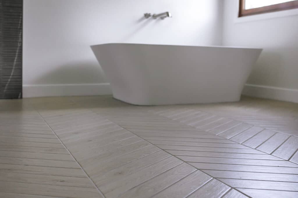 Niwot Master Bathroom Remodel with Woodgrain Flooring